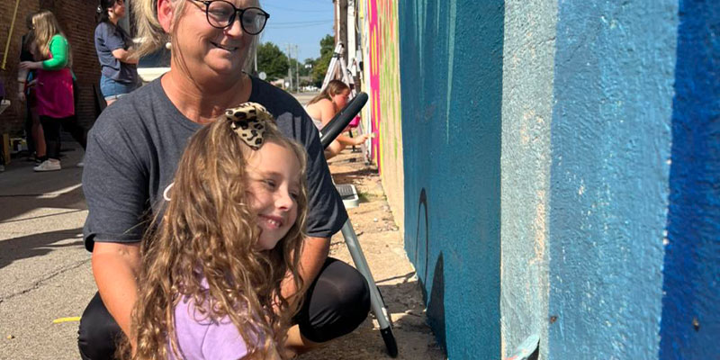 Woman and Child painting in the Art Alley