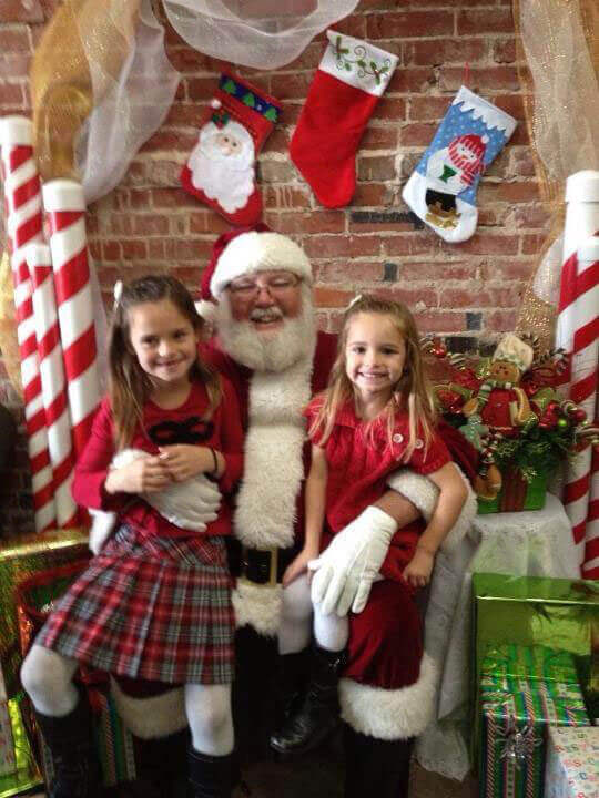 Two children visit Santa