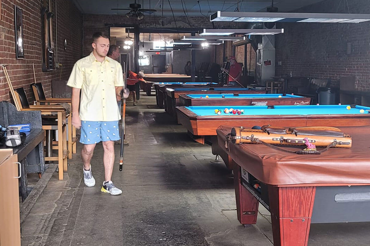 Customers Downtown enjoying Pool, at Percy's in their updated environment