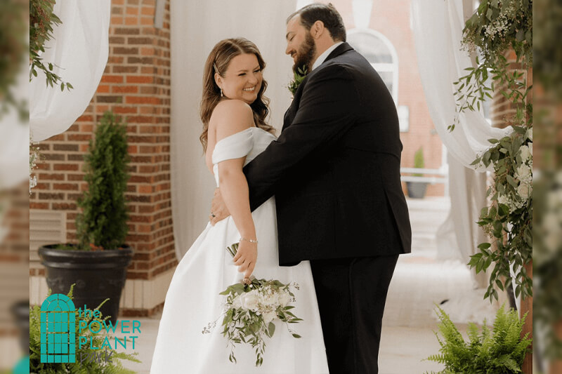 Bride and groom posing for a picture